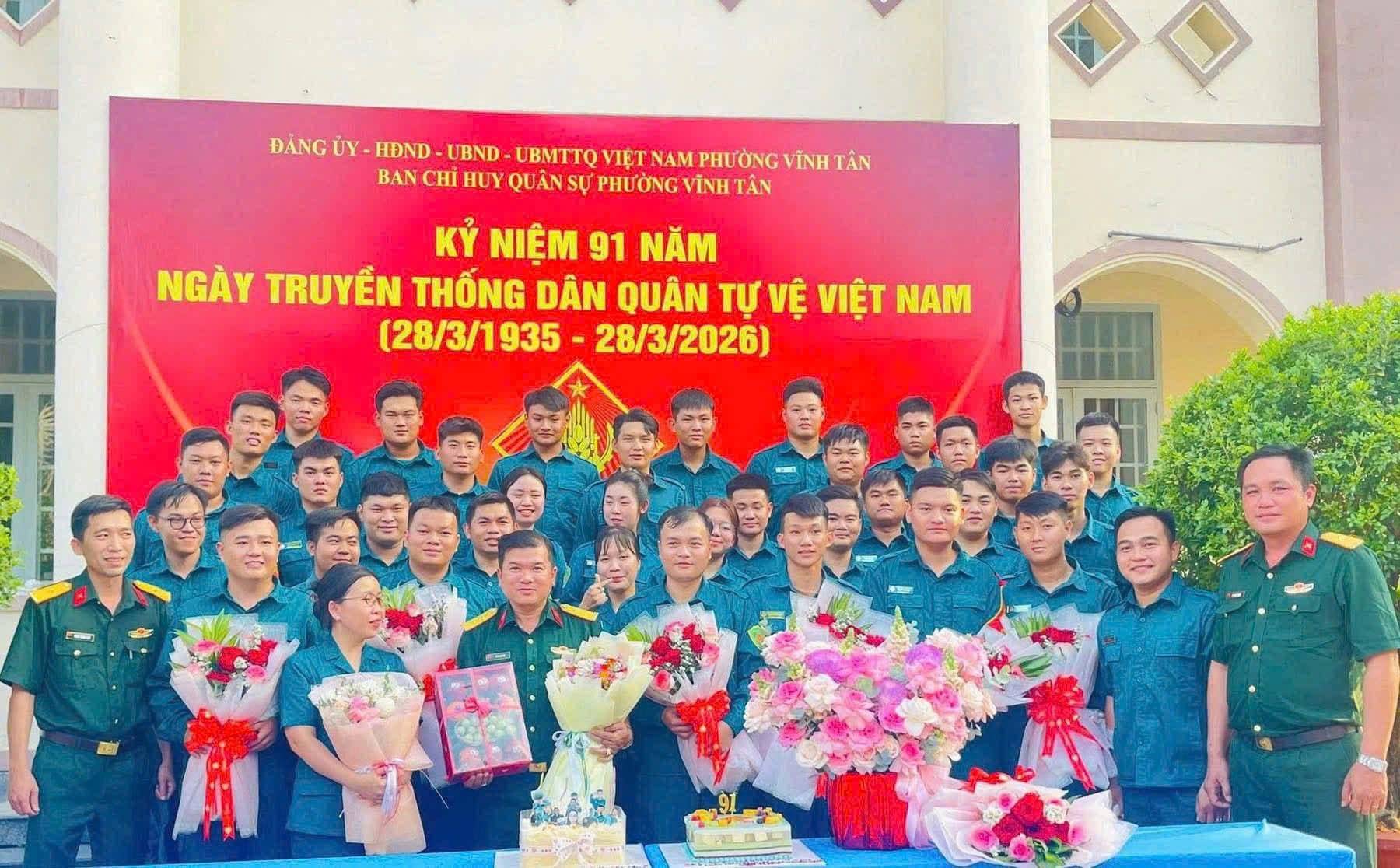 Có thể là hình ảnh về văn bản cho biết 'ĐÀNG ỦY HDND- UBND UBMTTO VIỆT NAM PHƯ ONG VÌNH TÂN BAN H HUY QU QUẢN SỰ PHƯỞNG VINHTÂN VÌNH TÂN KỶ NIỆM 91 NĂM NGÀY TRUYỂN THỐNG DÂN QUÂN TỰ VỆ VIỆT NAM (28/3/1935 28/3/2026) は上上 E'